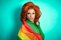 Happy drag queen celebrating gay pride holding rainbow flag Royalty Free Stock Photo