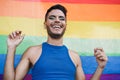 Happy drag queen having fun with rainbow flag in background - LGBT and transgender concept - Focus on face Royalty Free Stock Photo