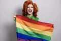 Happy drag queen holding rainbow flag - Lgbtq concept - Focus on face Royalty Free Stock Photo