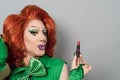 Happy drag queen artist doing makeup Royalty Free Stock Photo