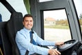 Happy driver driving intercity bus Royalty Free Stock Photo