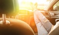 Happy driver inside car at sunset. Young woman have fun ride trip travel on road in summer sunny day. Drive vacation Royalty Free Stock Photo