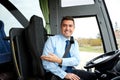 Happy driver inviting on board of intercity bus Royalty Free Stock Photo