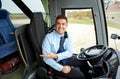 Happy driver inviting on board of intercity bus Royalty Free Stock Photo