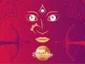 Happy dussehra celebration card with goddess face and archs