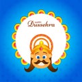 Happy Dussehra Celebration Greeting Card With Demon King Ravana Face Over White Round Frame On Blue