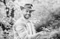 Happy earth day. Eco living. farming and agriculture cultivation. Gardening. muscular ranch man in cowboy hat care Royalty Free Stock Photo