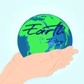 Happy Earth Day. Environmental safety. Conserve the earth. Two handsets, earth