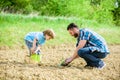 Happy earth day. Family tree. rich natural soil. Eco farm. small boy child help father in farming. new life. Ecological Royalty Free Stock Photo