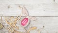 Happy Easer. close up of colorful easter eggs on white wooden background Royalty Free Stock Photo