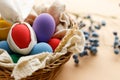 Happy Easer eggs in a basket Royalty Free Stock Photo