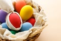 Happy Easer eggs in a basket Royalty Free Stock Photo