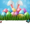 Happy Easter background with colored decorated eggs, insects and bunny ears on blue background Royalty Free Stock Photo