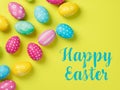 Happy Easter Banner with multiple coloured Easter eggs on a Yellow background Royalty Free Stock Photo