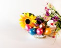 Happy easter.basket with Easter eggs and flowers. Royalty Free Stock Photo