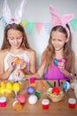 Happy easter. Beautiful little kids wearing bunny ears on Easter day.