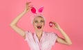 Happy Easter. Beautiful young woman with bunny ears and Easter egg. Hunting eggs.