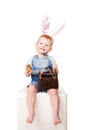 Happy Easter Bunny baby laughing. Royalty Free Stock Photo