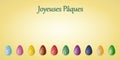 Happy Easter card in French language with painted Easter eggs Royalty Free Stock Photo