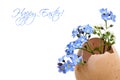 Happy Easter card with spring flowers in eggshell Royalty Free Stock Photo