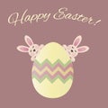 Happy Easter card with two bunnies behind the decorated egg Royalty Free Stock Photo
