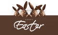 Happy easter, chocolate funny bunnies showing the sign with text Royalty Free Stock Photo