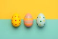 Happy Easter. Close-up of three easter eggs Royalty Free Stock Photo