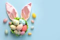 Happy Easter. Colorful easter painted eggs on bunny ears with copy space for text Royalty Free Stock Photo
