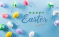 Happy easter! colourful Easter eggs with flower ant the text on pastel blue background Royalty Free Stock Photo