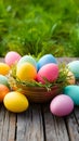 Happy Easter concept colorful eggs on wooden table outdoors Royalty Free Stock Photo