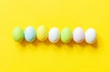 Happy Easter concept. Preparation for holiday. Easter candy chocolate eggs colorful pastel sweets and bunny toy isolated on trendy Royalty Free Stock Photo