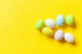 Happy Easter concept. Preparation for holiday. Easter candy chocolate eggs colorful pastel sweets and bunny toy isolated on trendy Royalty Free Stock Photo