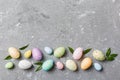 Happy Easter concept. Preparation for holiday. Easter eggs on colored background. flat lay top view copy space banner Royalty Free Stock Photo