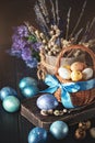 Happy Easter. Congratulatory easter background. Easter eggs and flowers. Selective focus. Royalty Free Stock Photo