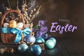 Happy Easter. Congratulatory easter background. Easter eggs and flowers. Selective focus. Royalty Free Stock Photo