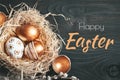 Happy Easter. Congratulatory easter background. Easter eggs and flowers. Selective focus. Royalty Free Stock Photo