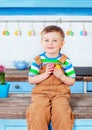 Happy easter. Cute boy getting ready for the holiday Royalty Free Stock Photo