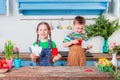 Happy easter. Cute brother and sister, funny kids boy and girl are preparing for the holiday Royalty Free Stock Photo