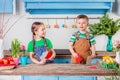 Happy easter. Cute brother and sister, funny kids boy and girl are preparing for the holiday Royalty Free Stock Photo