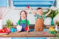 Happy easter. Cute brother and sister, funny kids boy and girl are preparing for the holiday Royalty Free Stock Photo