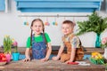 Happy easter. Cute brother and sister, funny kids boy and girl are preparing for the holiday. Royalty Free Stock Photo