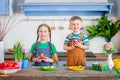 Happy easter. Cute brother and sister, funny kids boy and girl are preparing for the holiday. Royalty Free Stock Photo