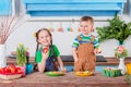 Happy easter. Cute brother and sister, funny kids boy and girl are preparing for the holiday. Royalty Free Stock Photo