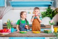 Happy easter. Cute brother and sister, funny kids boy and girl are preparing for the holiday. Royalty Free Stock Photo