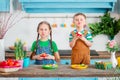 Happy easter. Cute brother and sister, funny kids boy and girl are preparing for the holiday Royalty Free Stock Photo