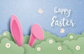 Happy Easter day background with bunny hide in grass in paper cut style. Digital craft paper art