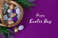 Happy Easter Day.Greeting card or banner for sale of a store or website.Golden, white, purple eggs in a basket on a Royalty Free Stock Photo