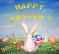 Happy Easter! Easter bunnies and eggs in field Royalty Free Stock Photo