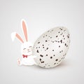 Happy Easter. Easter Rabbit bunny with realistic big egg isolated on gray background. Cute, funny cartoon rabbits Royalty Free Stock Photo