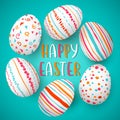 Happy Easter eggs frame with text. Colorful easter eggs on blue. hand font. Scandinavian ornaments. Royalty Free Stock Photo